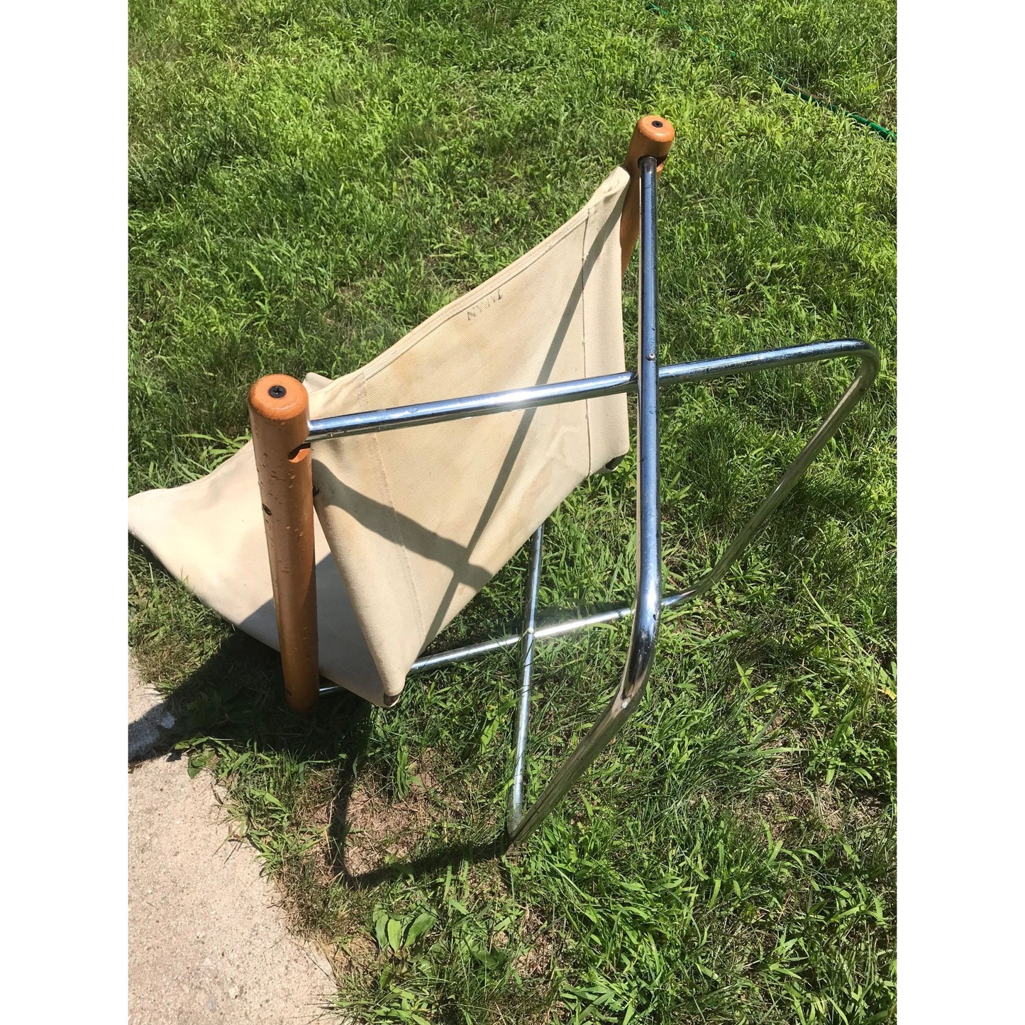 Mid Century Modern Thick Beige Canvas Fold Up Chair Round Wooden Handles Sits Low Metal Legs