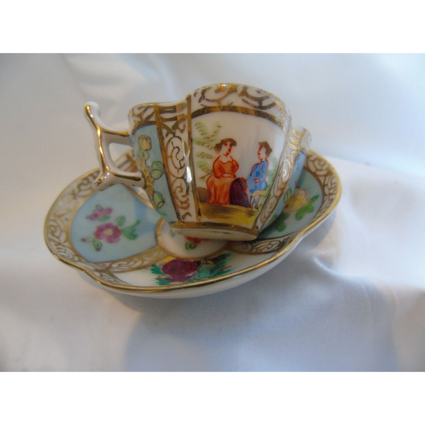 Vintage Dresden Style Hokutosha Occupied Japan Hand Painted Light Blue Courting Couple Cup & Saucer